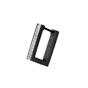 Close-up of black rectangular titanium huggie earring with vertical clear zircon inlay