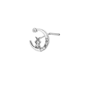 Detailed close-up of silver L-shaped nose stud with crescent moon and cat design with zircons