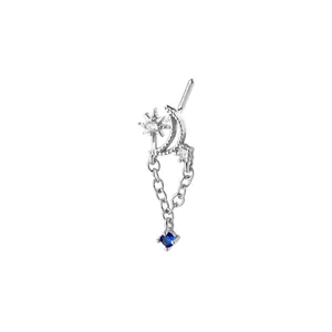 L-shaped silver nose stud with star, crescent moon, and dangling blue square gem