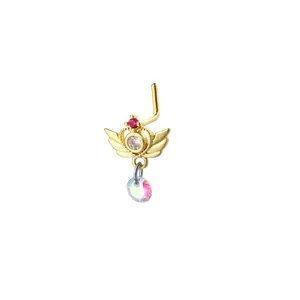 Detailed shot of L-shaped nose stud with winged crown and aurora crystal pendant