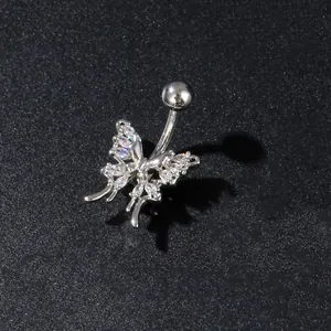 Silver butterfly belly button ring with sparkling zircon stones on a black surface