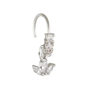 Macro detail of silver nose stud with sparkling cubic zirconia lotus petal design
