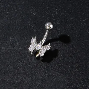 Macro view of butterfly belly button ring with silver plating and sparkling cubic zirconia