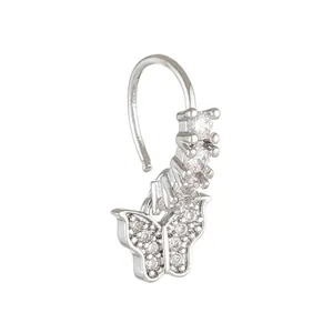 Close-up of silver nose ring featuring a crystal butterfly and three zircon stones
