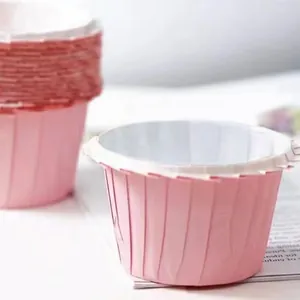 Pink tulip style muffin liners made of greaseproof paper for professional baking