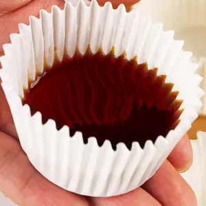 Waterproof white paper cupcake liner showing strong leak-proof performance with liquid