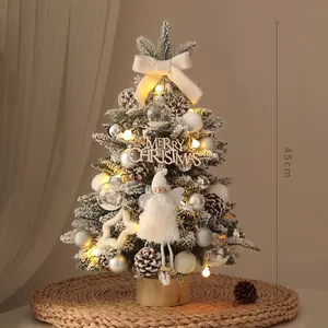 Detailed 45cm mini tabletop Christmas tree with snow effect, LED lights, and ornaments