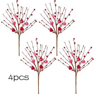 Detailed view of 4pcs artificial red berry stems with heart ornaments for home decoration