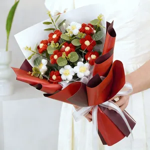 Handmade knitted rose bouquet with LED lights in premium red gift wrapping for girlfriend