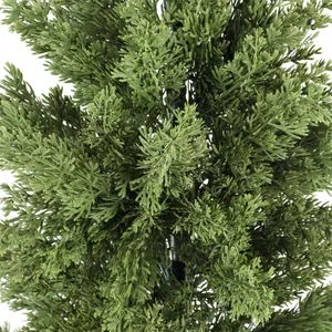 Close-up of realistic green faux cypress needles with detailed plastic feather texture