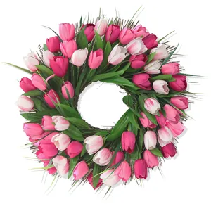 Handmade artificial tulip wreath with pink and white silk flowers on a natural vine base