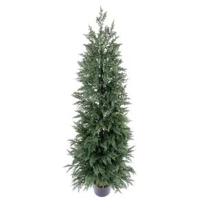 Artificial tall cypress tree in a black pot with dense dark green foliage on white background