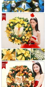 Detailed view of artificial Christmas wreath with LED lights and golden decorative ornaments