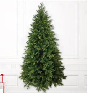 Detailed view of lush PE mixed green Christmas tree with stable black metal stand