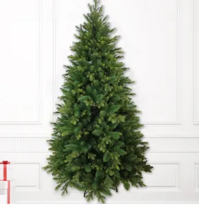 Detailed view of lush mixed PE green artificial Christmas tree with sturdy metal base