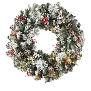 75cm snowy Christmas wreath with LED lights, pine cones and red berries on white background