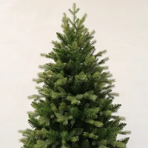 Detailed close-up of dense PE and PVC pine needles on a premium artificial Christmas tree