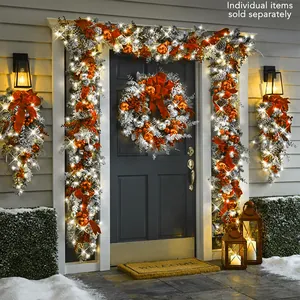 Red and silver flocked Christmas wreath and garland set with warm LED lights
