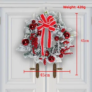 Detailed view of a 45cm flocked Christmas wreath with red bow and 420g weight spec