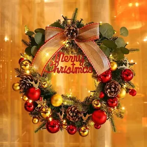 Christmas wreath with LED lights, red gold baubles, reindeer and Merry Christmas sign