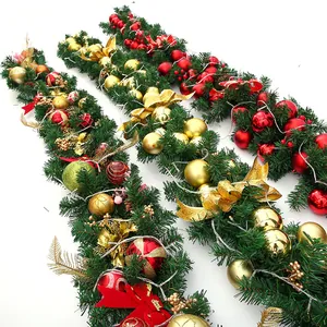 2.7m Christmas garland with LED lights, colorful ornaments, and festive bows on pine needles