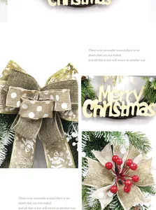 Detail of burlap bow with gold trim and Merry Christmas wooden sign on festive wreath