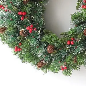 60cm frosted Christmas wreath with red berries, pine cones and warm LED lights