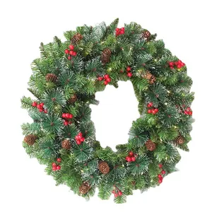 60cm frosted Christmas wreath with red berries, pinecones and warm white LED lights