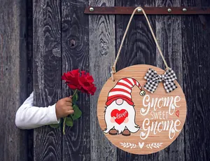 Rustic round wooden door sign featuring a cute gnome and Gnome Sweet Gnome text print