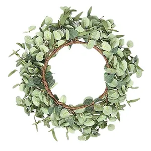 Artificial eucalyptus wreath for front door decor featuring natural green leaves on twig base
