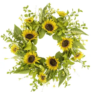 Detailed view of sunflower wreath with vibrant yellow petals and mixed green foliage