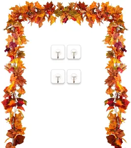 Set including two artificial autumn maple leaf garlands and four clear adhesive wall hooks