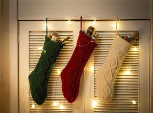 Set of three 46cm large knit Christmas stockings in red green and cream for holiday gifts