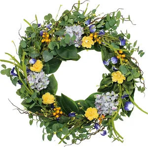 Artificial spring floral wreath with hydrangea and roses on a natural grapevine base