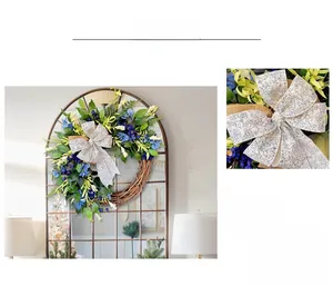 Close-up of blue and yellow floral wreath with printed silver ribbon for home wall decor