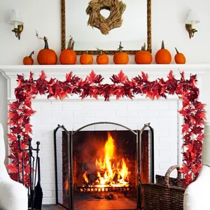 Artificial maple leaf garland on fireplace mantel for Thanksgiving home autumn decoration