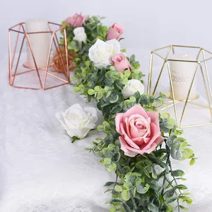 Artificial eucalyptus vine with pink and white roses for wedding table decoration