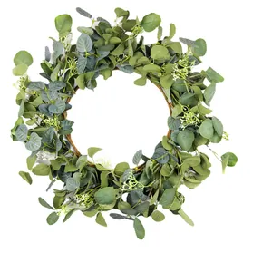 Artificial eucalyptus wreath with green leaves and white buds on white background
