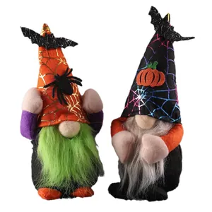 Set of 2 plush Halloween gnomes with spider web hats, bat icons and pumpkin details