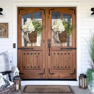 Close-up of artificial hydrangea door baskets with rattan base and polka dot bows