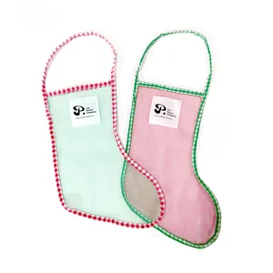 Christmas stocking mesh gift bags with plaid handles in mint green and soft pink colors