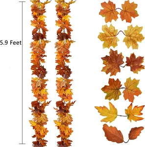 Detail of 5.9ft autumn maple leaf garlands in orange and red for seasonal decoration