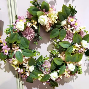 Spring floral wreath with pink pom-pom flowers and white roses for front door decor