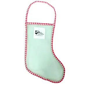 Christmas stocking storage net bag with light green mesh and red white gingham trim