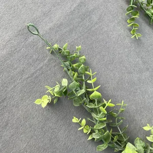 Macro detail of artificial eucalyptus vine with natural yellow-green gradient leaves