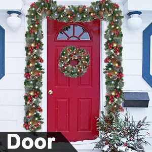 Christmas garland and wreath set with LED lights on a door with red berries and cones