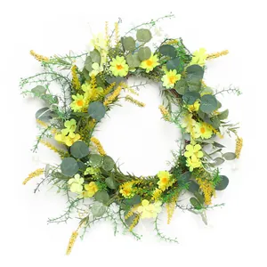 Artificial spring daisy wreath with green eucalyptus leaves and natural rattan base