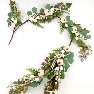 Artificial white pumpkin and berry garland with eucalyptus leaves for wedding table decor