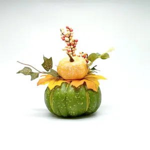Detailed close-up of double-layered faux pumpkin with autumn leaves and berry branches
