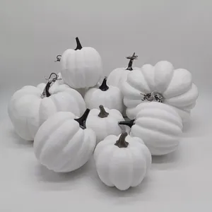 Set of matte white artificial pumpkins with black stems for autumn and Halloween decor